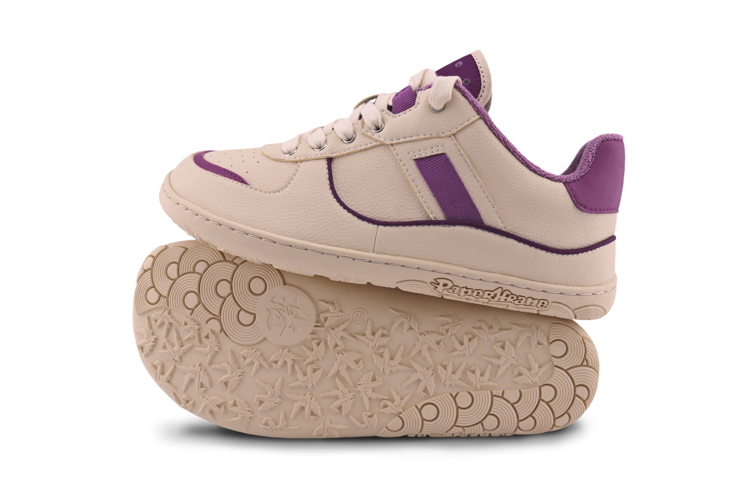 Side and sole view of PLUM sneaker, in cream vegan leather with purple details. 