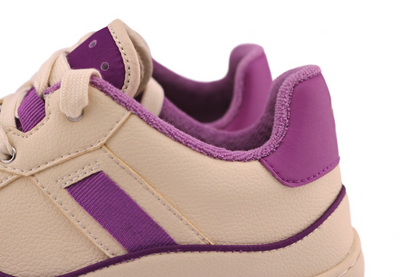 Close view of ankle area of PLUM sneaker.