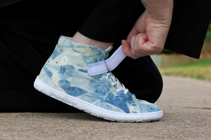 Blue and cream tie dye Stonewash mid top with velcro opening.