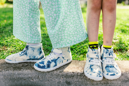 TWO JNR PAIRS ON A CURB