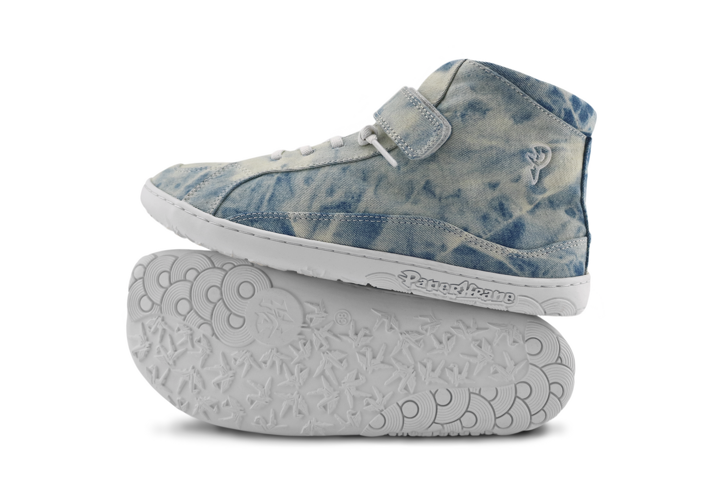 Side and sole view of STONEWASH mid top boots - blue tie dye on cream canvas with white sole